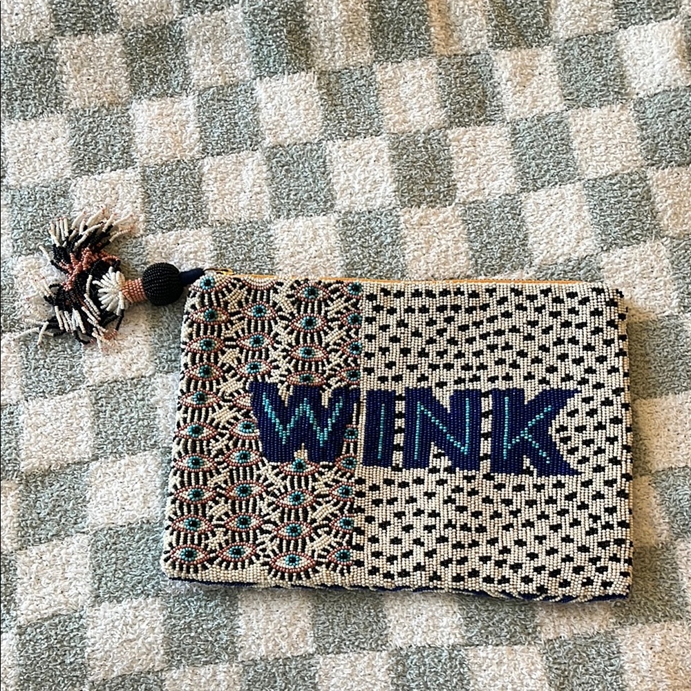 Anthropologie Black and Cream Patterned Clutch